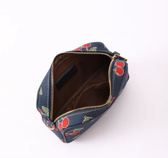 CAMERA-CHERRY-BLUE | Cherry Camera Crossbody Bag On Blue Backdrop