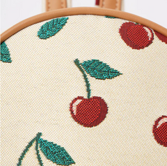DAPK-CHERRY-CREAM | Cherry Small Rucksack In Cream Backdrop